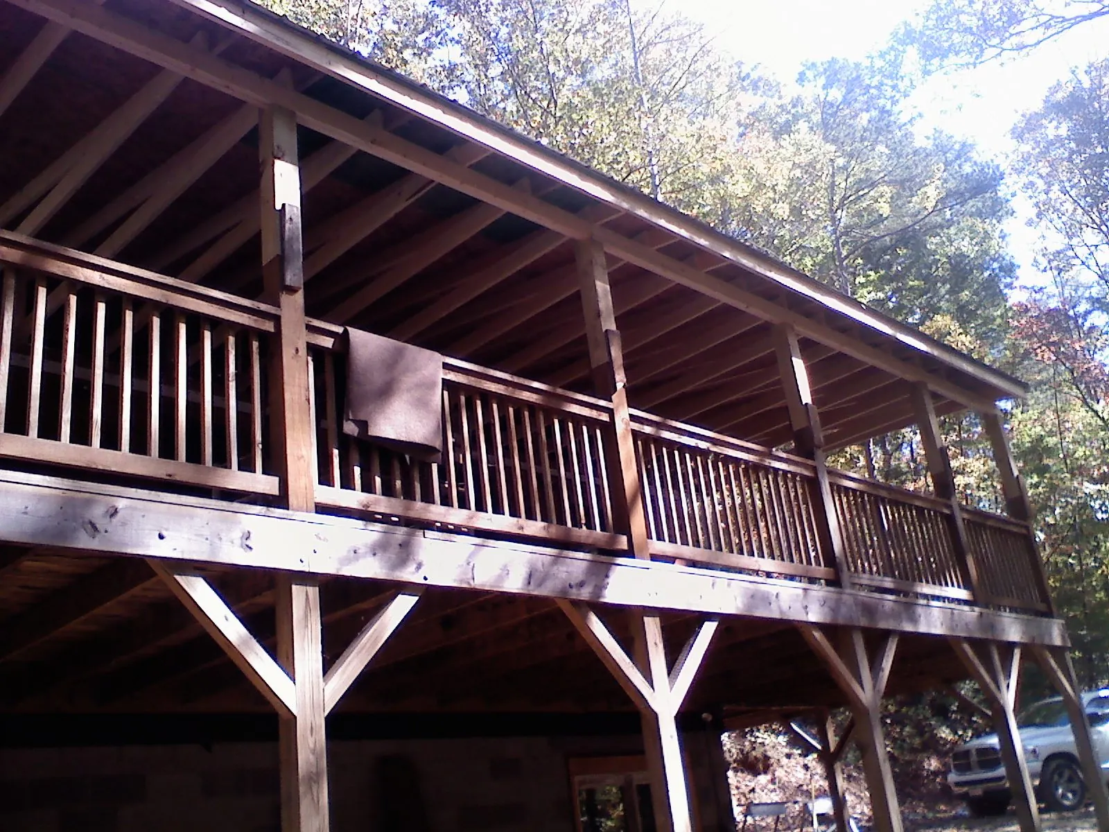 Timber framing under a new elevated porch and deck — Roof Leak Repair in Jeannette by Roofing Brothers